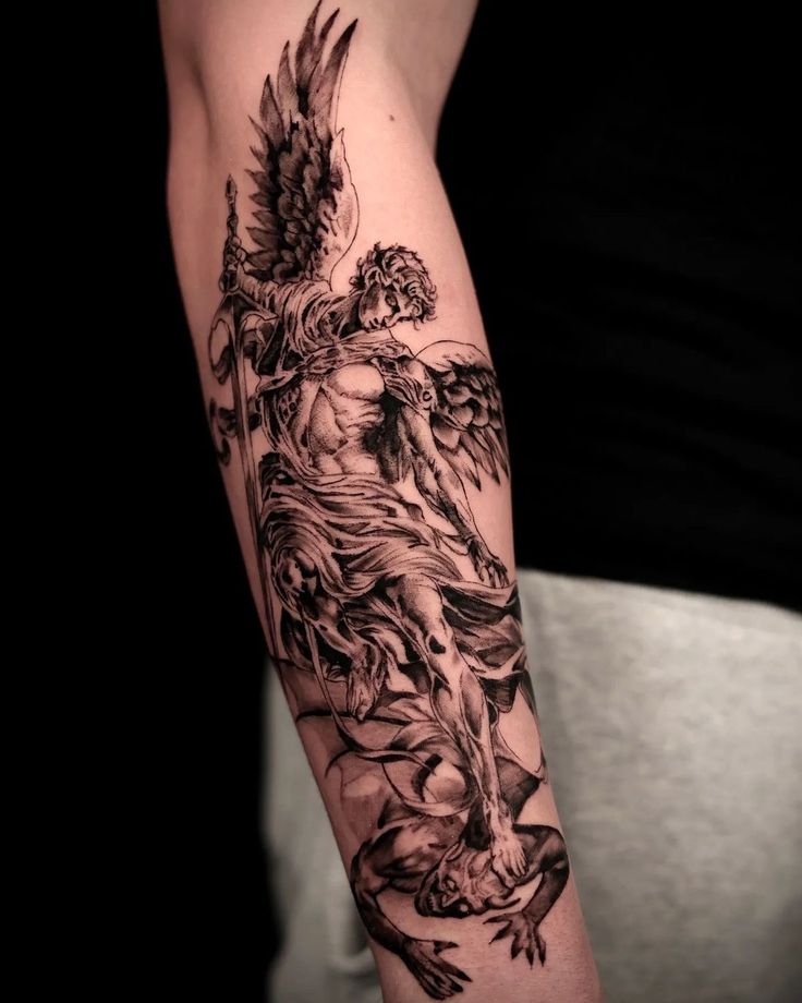 Epic Battle of Angel and Demon Forearm Tattoo