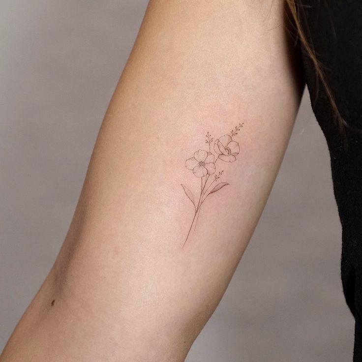 Delicate Daisy and Cosmos Flower Tattoo