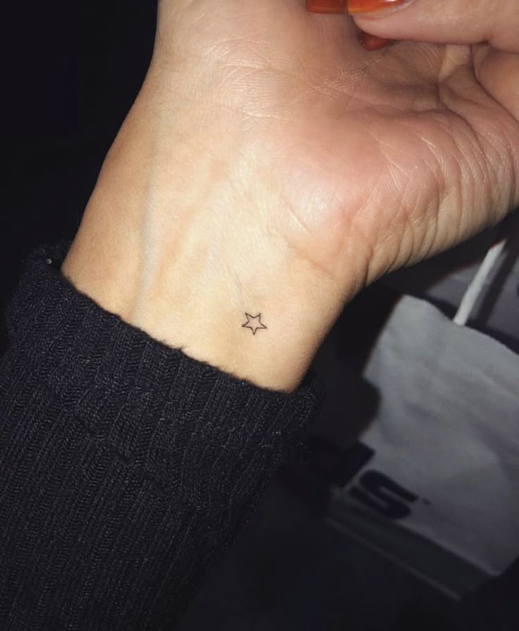 Tiny Star Minimalist Tattoo