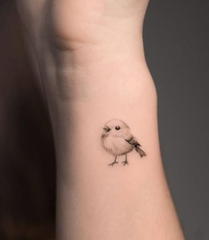 Charming Minimalist Bird Tattoo for the Wrist