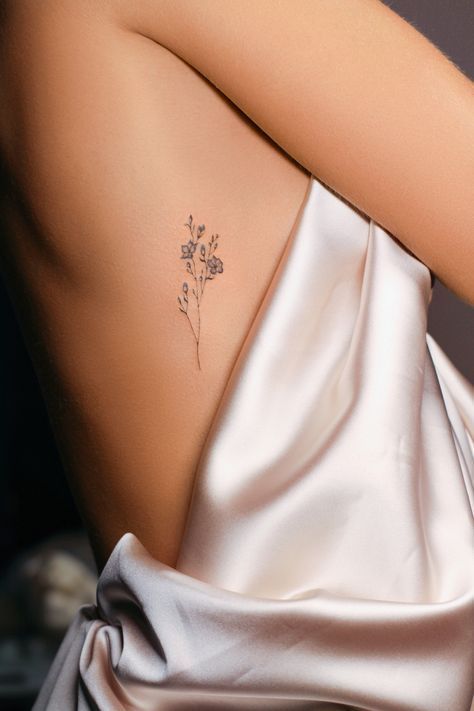 Delicate Floral Minimalist Tattoo