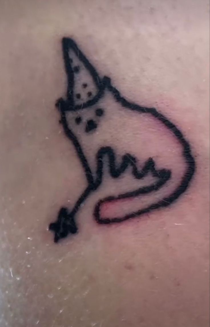 Playful Minimalist Cat Tattoo