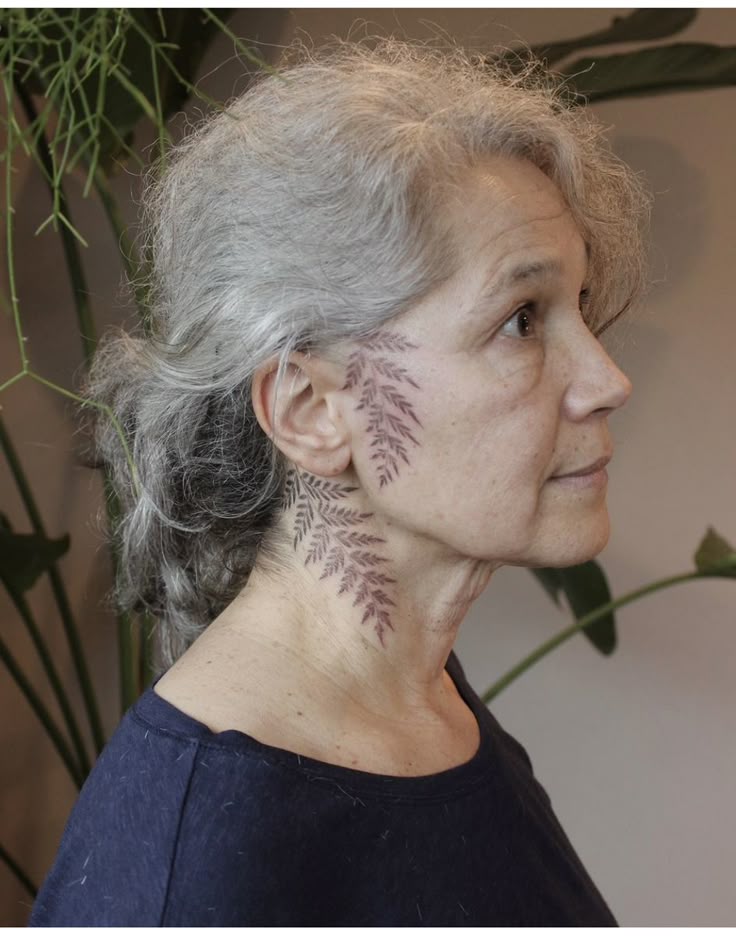 elegant floral neck tattoo design