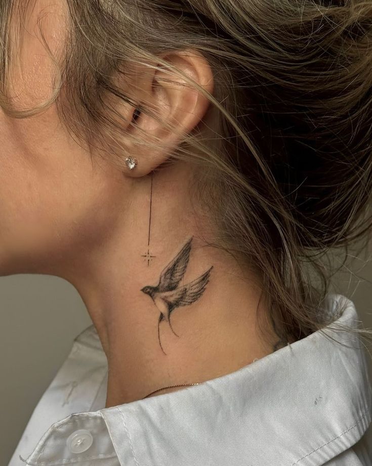 delicate bird neck tattoo design