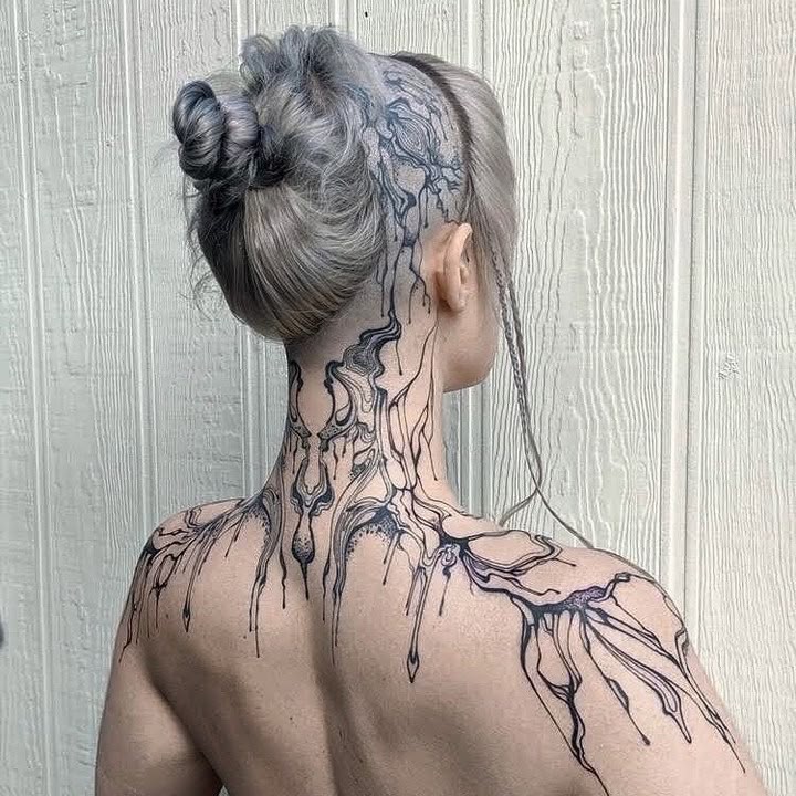 Stunning Abstract Blackwork Neck Tattoo