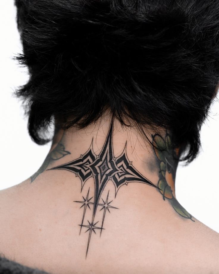striking blackwork neck tattoo design