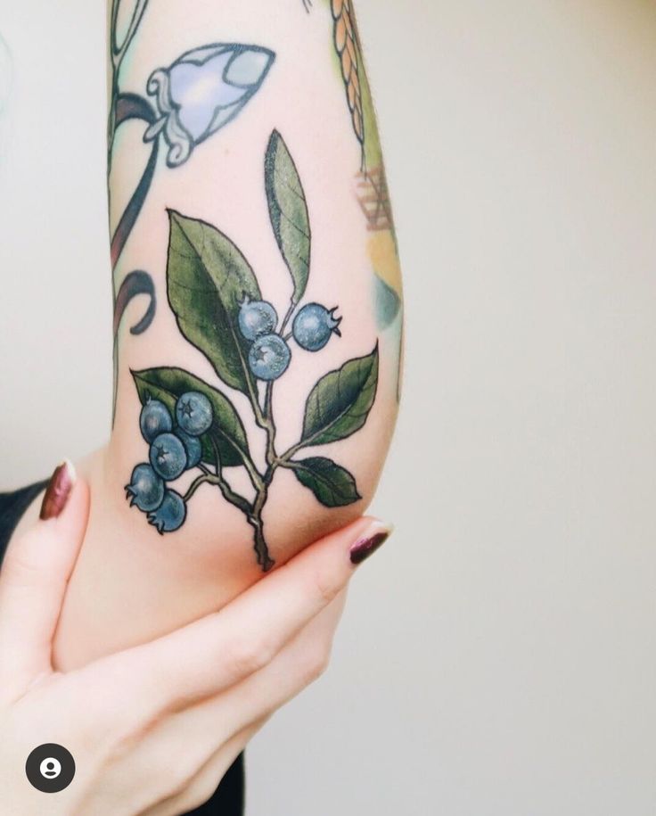 Vibrant Mother Nature Arm Tattoo