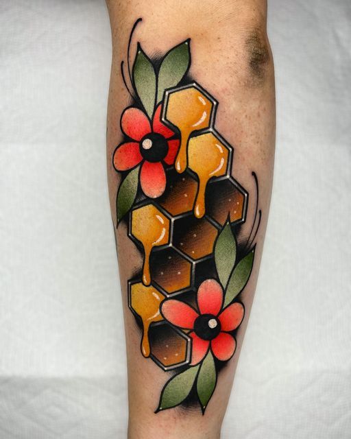 Vibrant Honeycomb and Floral Tattoo
