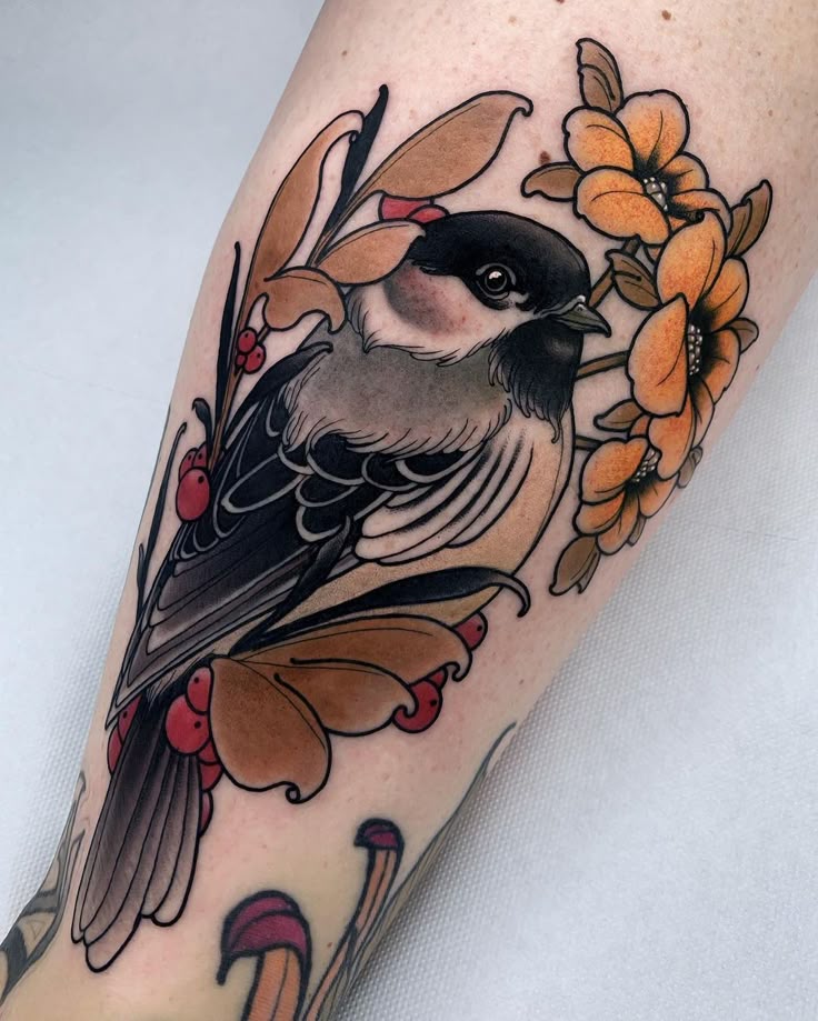 Vibrant Neo-Traditional Bird and Flower Tattoo