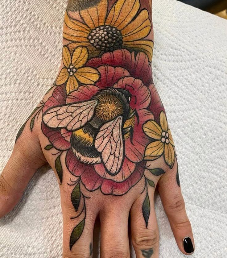 Vibrant Butterfly Hand Tattoo