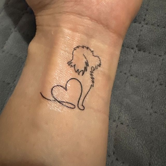 Minimalist Dog Heart Outline Tattoo - A Tribute to Puppy Love