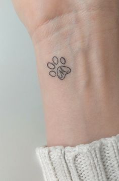 Minimalist Paw Print Tattoo for Pet Lovers