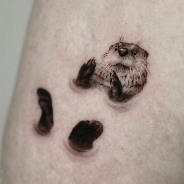 Charming Otter Tattoo Design