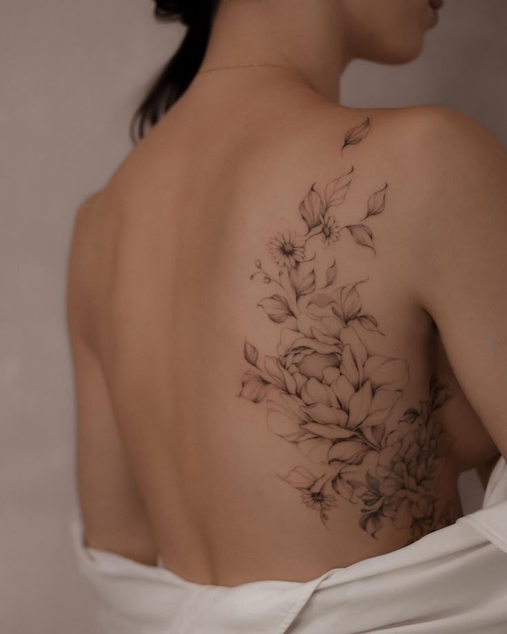 Elegant Floral Rib Tattoo Design