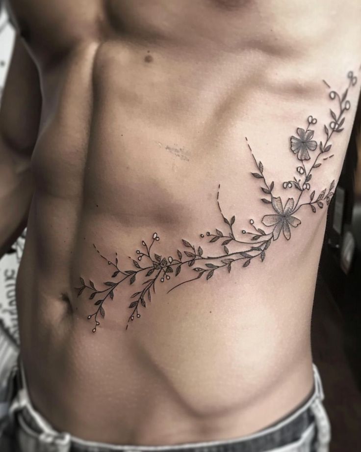 Elegant Floral Rib Tattoo Design