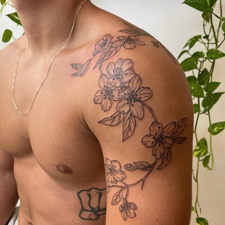 Elegant Cherry Blossom Shoulder Tattoo Inspiration