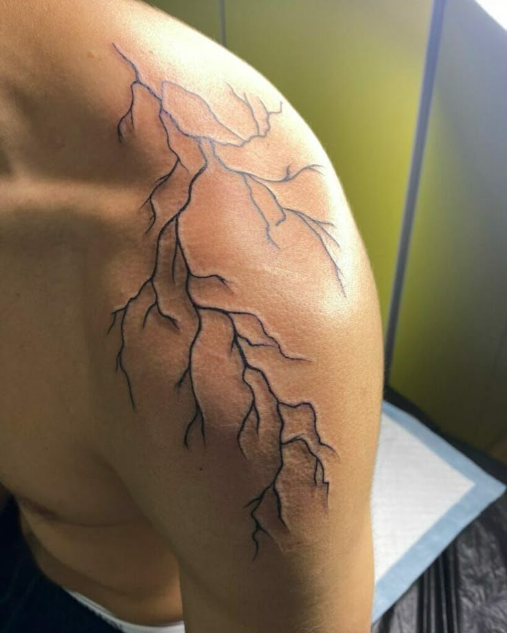 Striking Lightning Shoulder Tattoo