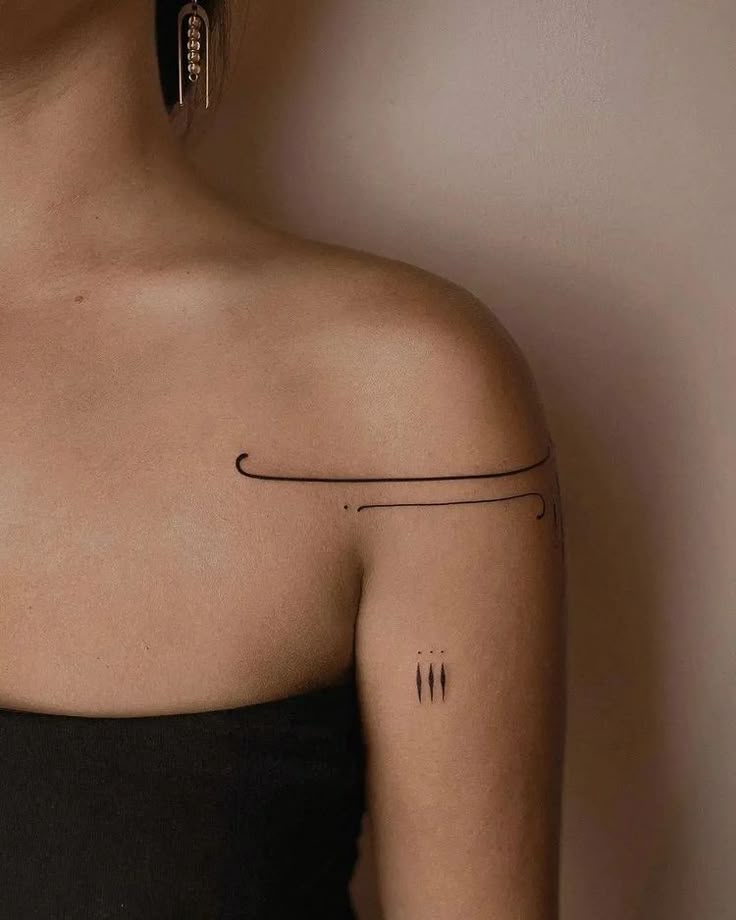 Elegant Minimalist Shoulder Tattoo