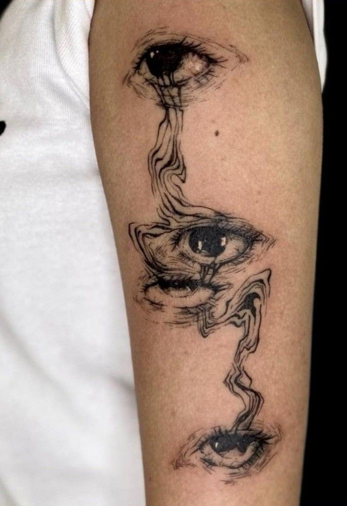 Flowing Eyes Abstract Tattoo