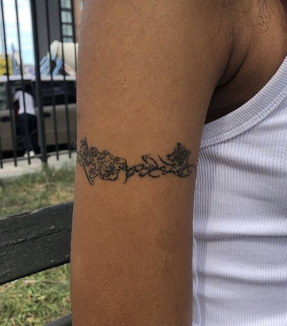 Elegant Floral Blackwork Arm Tattoo