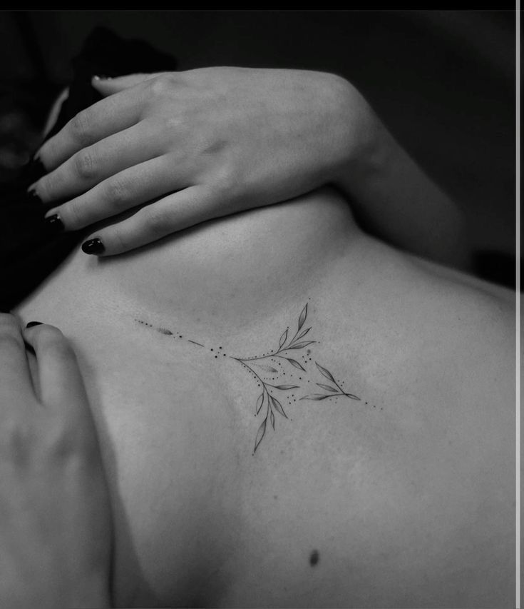 Delicate Floral Sternum Tattoo