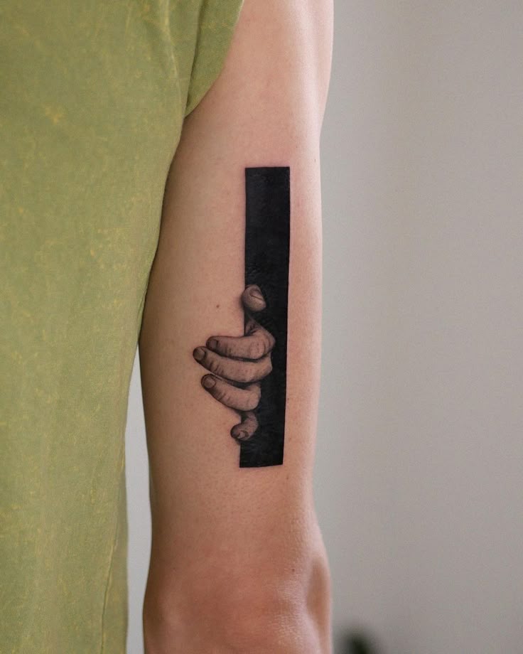 Minimalist Surrealism Arm Tattoo