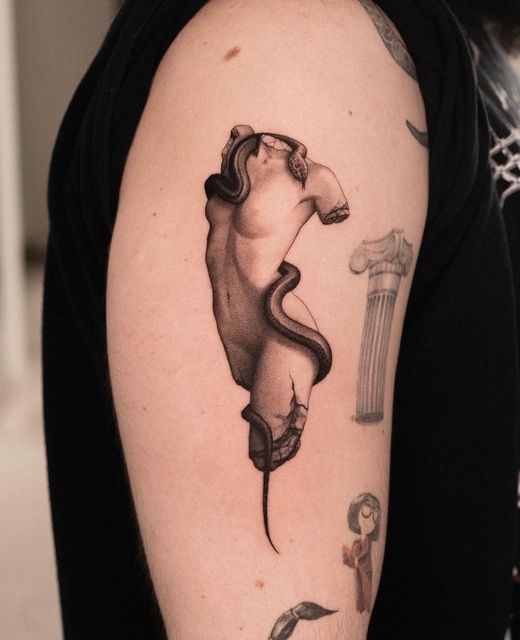 Surrealist Snake and Torso Tattoo