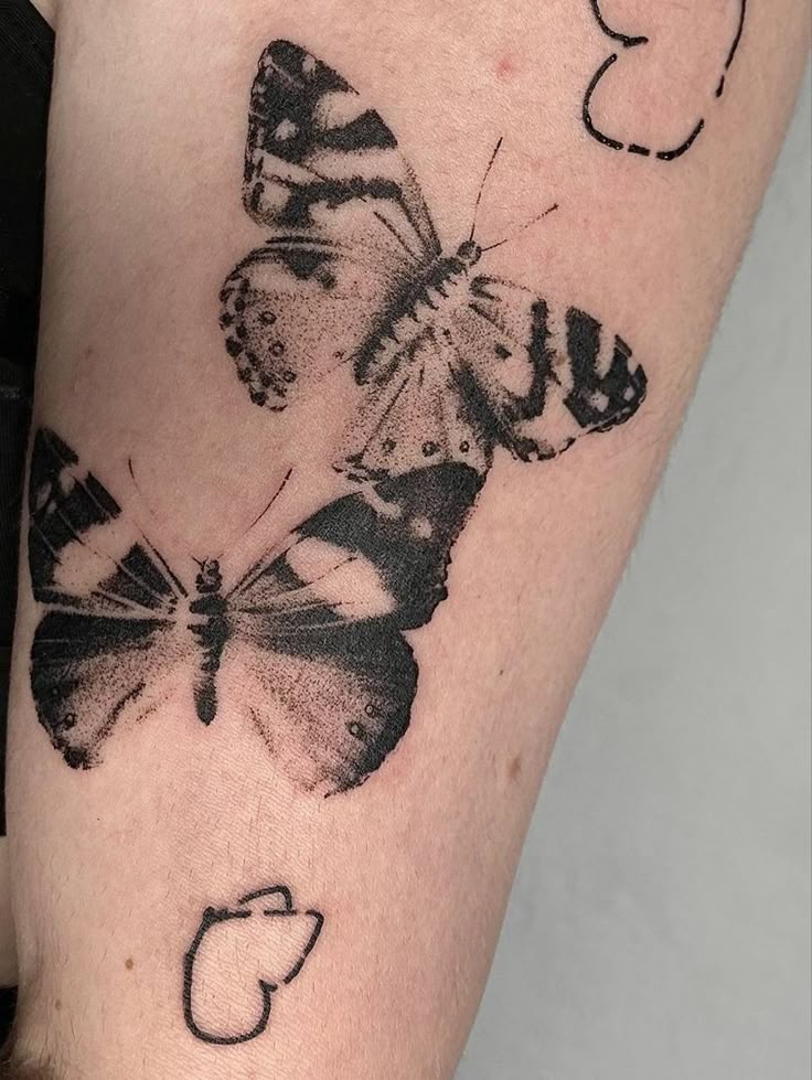Surreal Blackwork Butterfly Tattoo