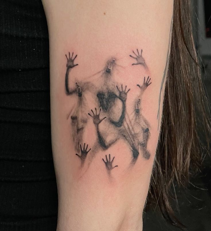 trapped hands surrealism tattoo