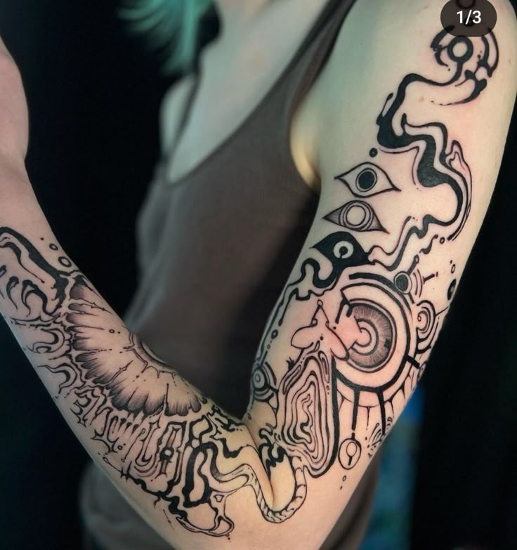 Intricate Abstract Surrealism Arm Tattoo