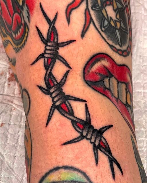 Bold Barbed Wire Ankle Tattoo