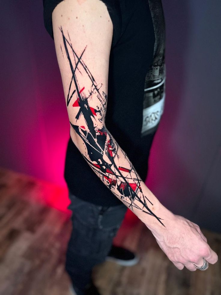 Dynamic Trash Polka Arm Tattoo
