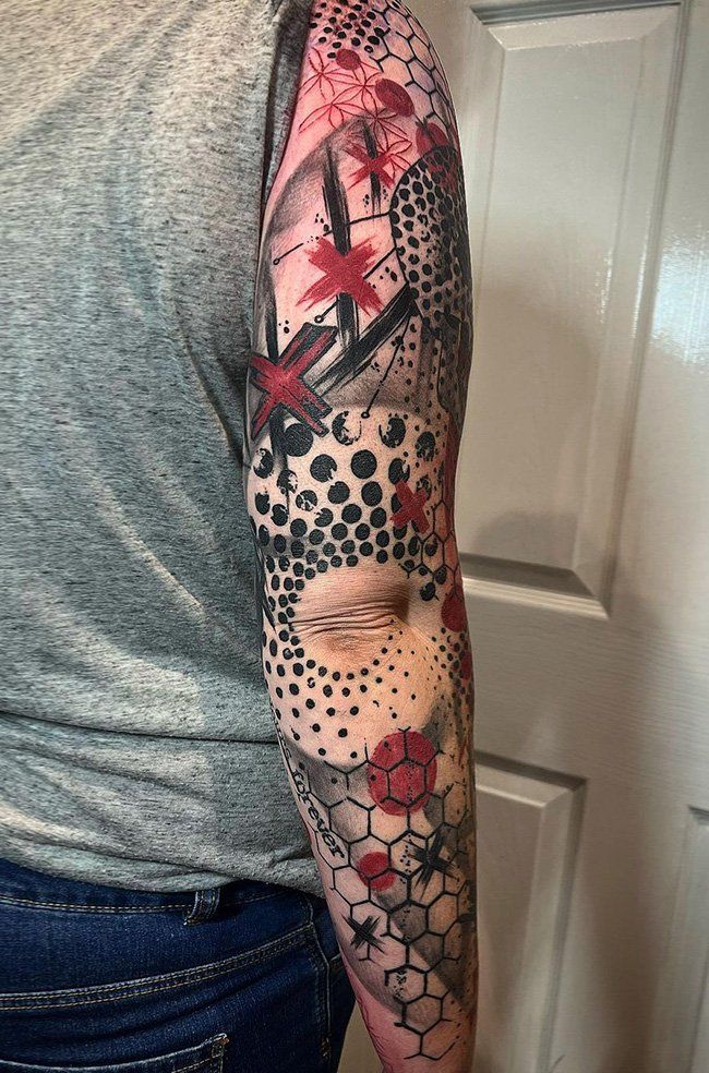 Bold Trash Polka Arm Tattoo Design