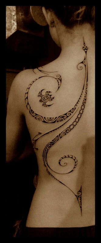 Elegant Tribal Back Tattoo Design