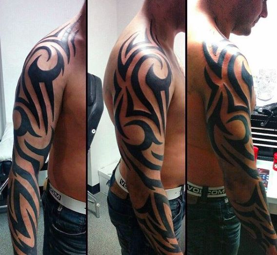 Bold Tribal Arm Tattoo Design