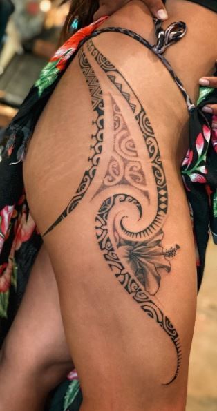 Elegant Hawaiian Tribal Thigh Tattoo