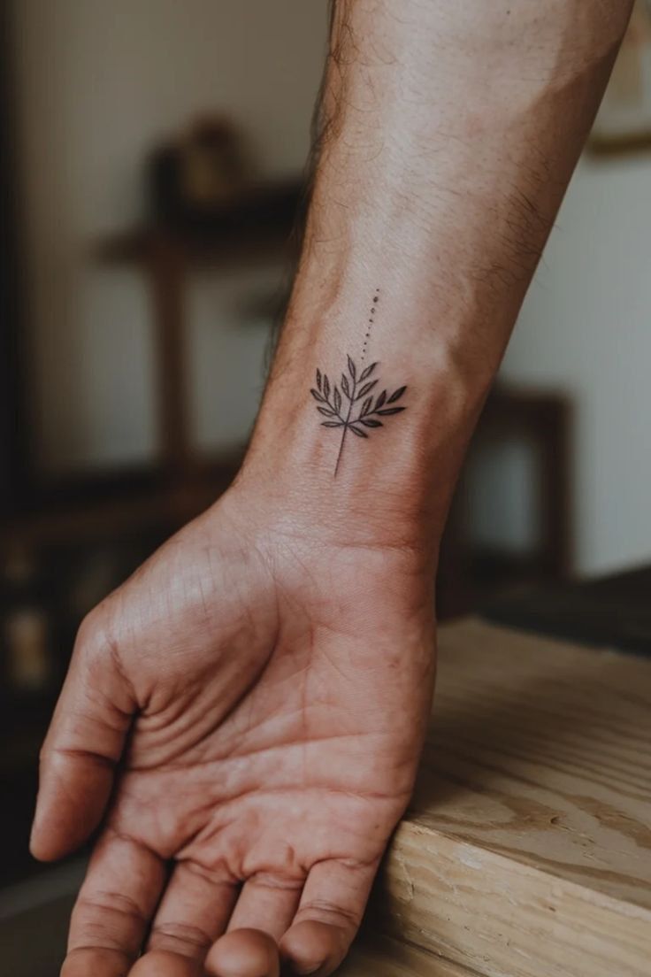 Elegant Minimalist Leaf Tattoo