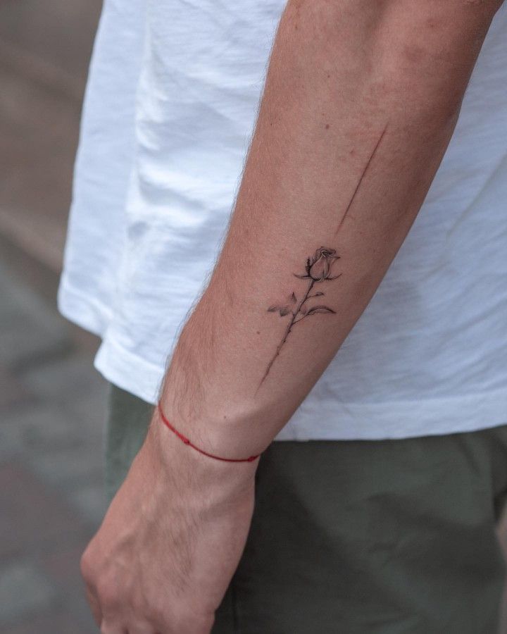 Elegant Fine Line Rose Tattoo for the Arm