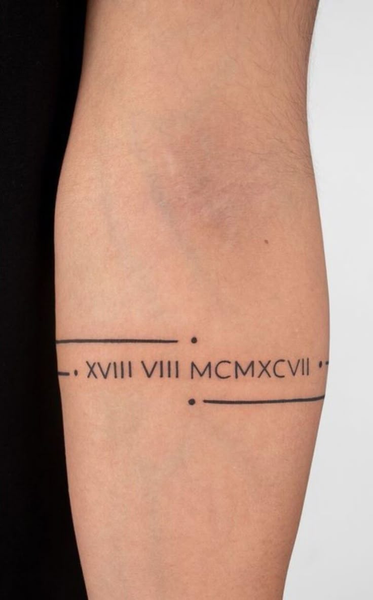 Minimalist Roman Numeral Forearm Tattoo