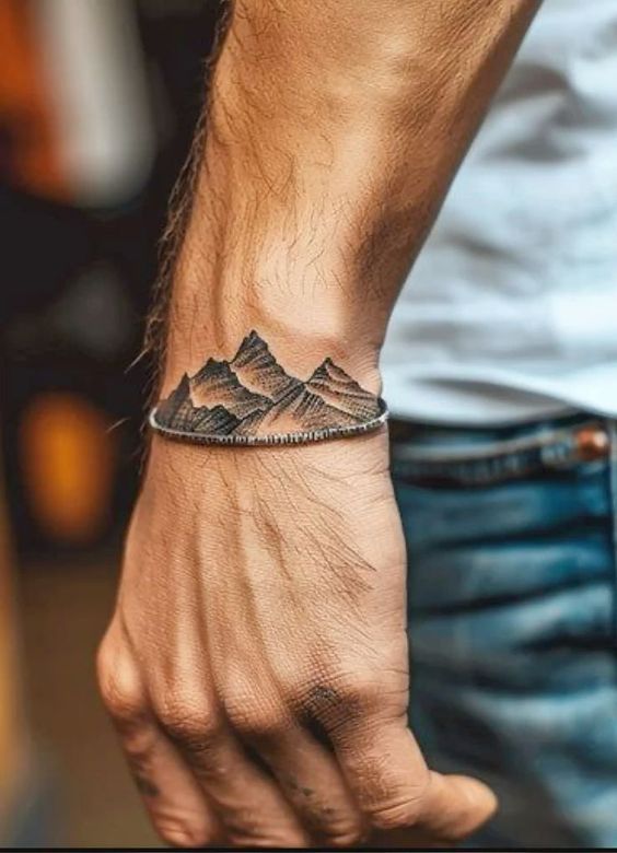 Stunning Mountain Hand Tattoo