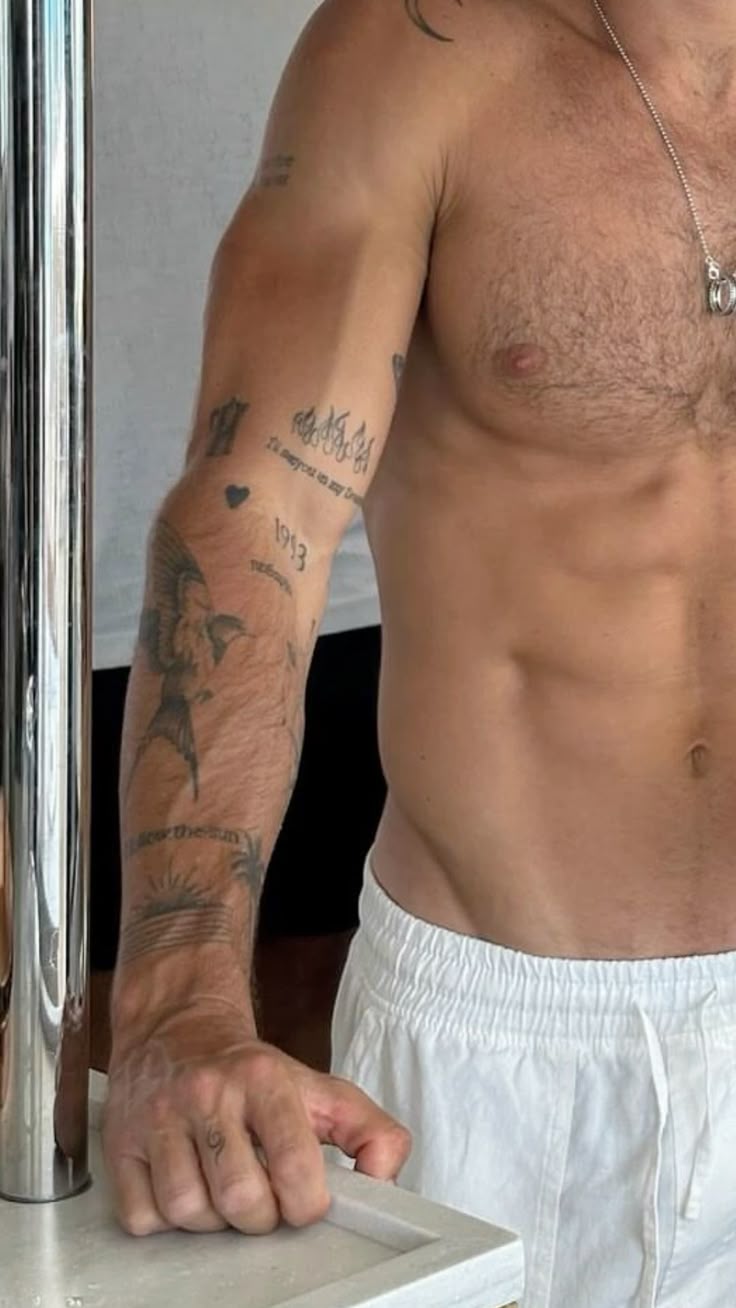 Bold Blackwork Tricep Tattoo for Men