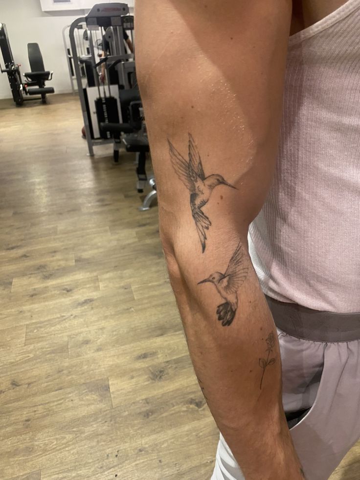 Elegant Hummingbird Arm Tattoo