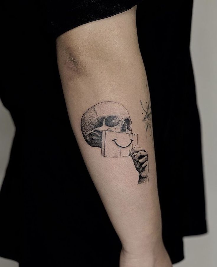 Skull and Smile Tattoo