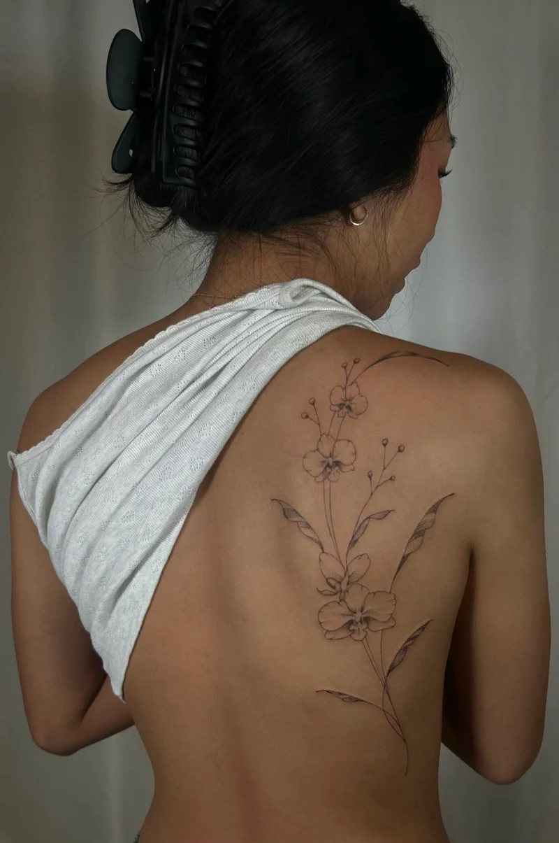 elegant floral back tattoo