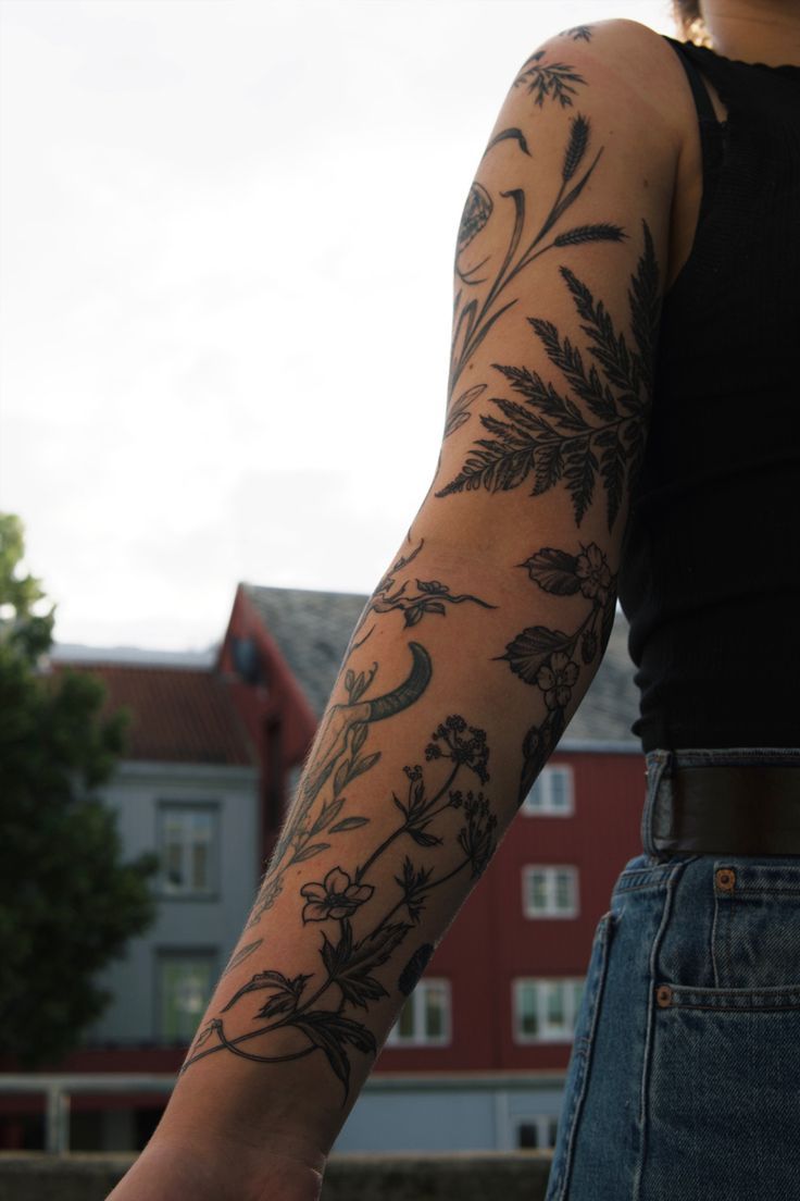 Elegant Floral Sleeve Tattoo Design