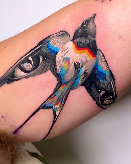 Vibrant Watercolor Bird Tattoo