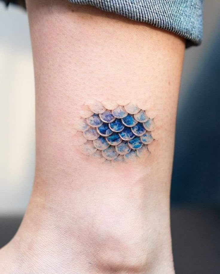 Charming Watercolor Aquatic Tattoo