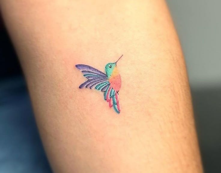Vibrant Watercolor Hummingbird Tattoo
