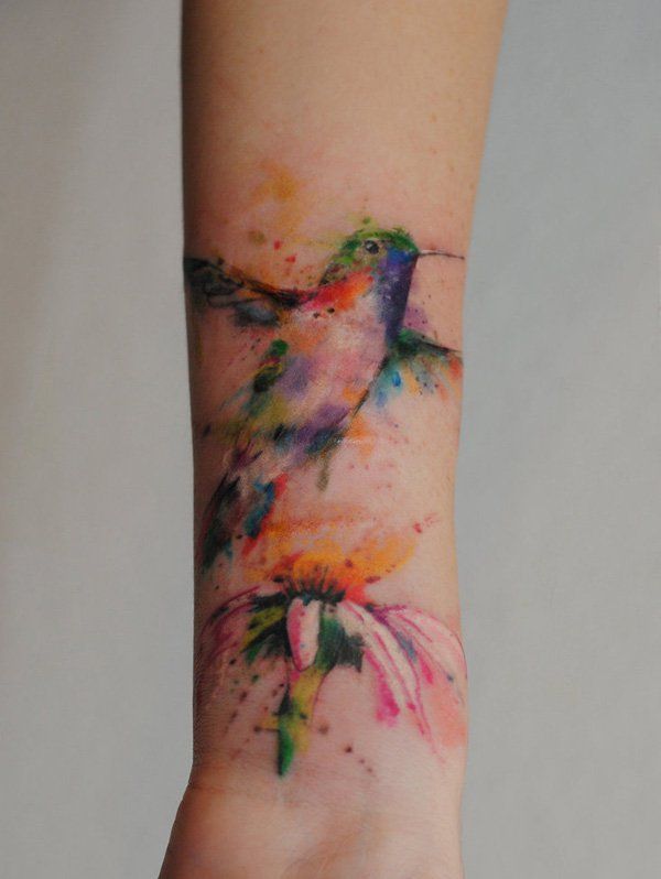 Vibrant Watercolor Hummingbird Tattoo