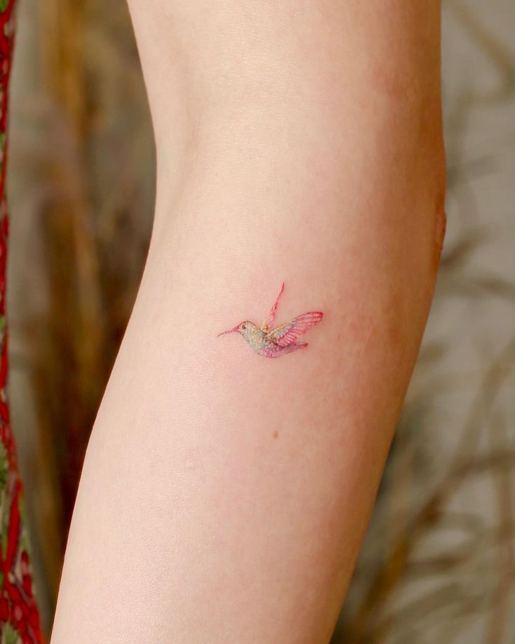 Vibrant Watercolor Hummingbird Tattoo for Nature Lovers